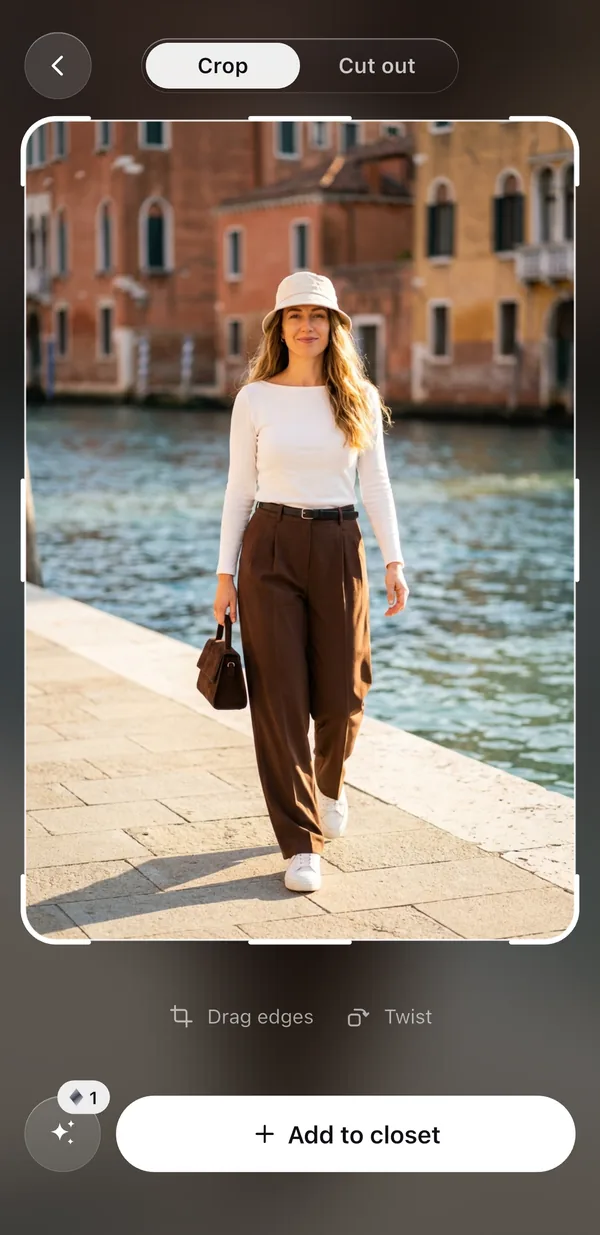 A photo of a woman in a beige bucket hat, white top, brown trousers, a brown bag and white sneakers, open in Wearbird's Lift editor